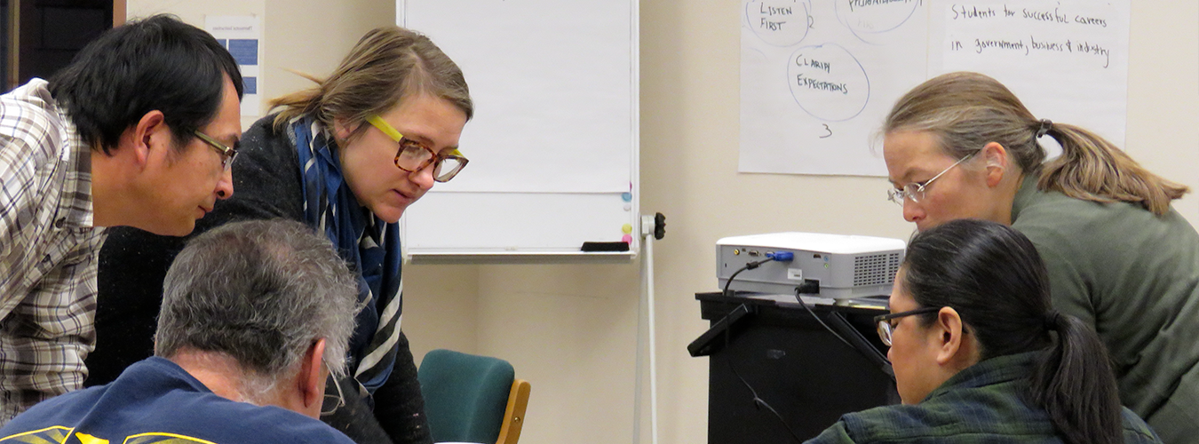 professors looking at something intently 