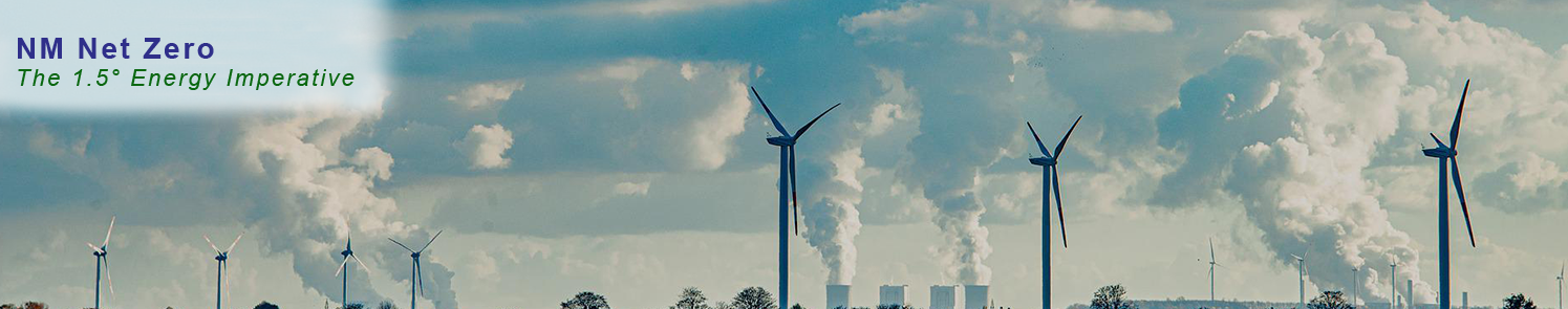 image of windmills in front of smoke stacks 