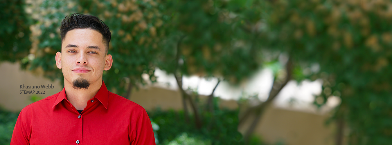 Male student wearing red outside