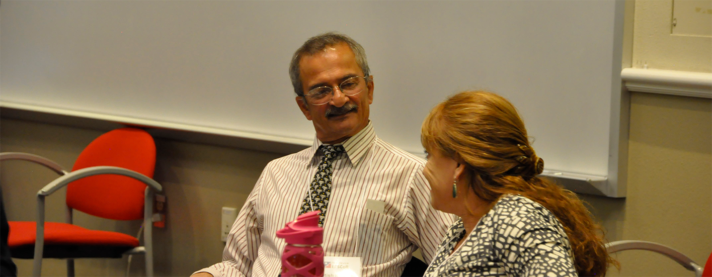 Satish Ranade speaking with Jane Lehr at 2019 project all hands meeting