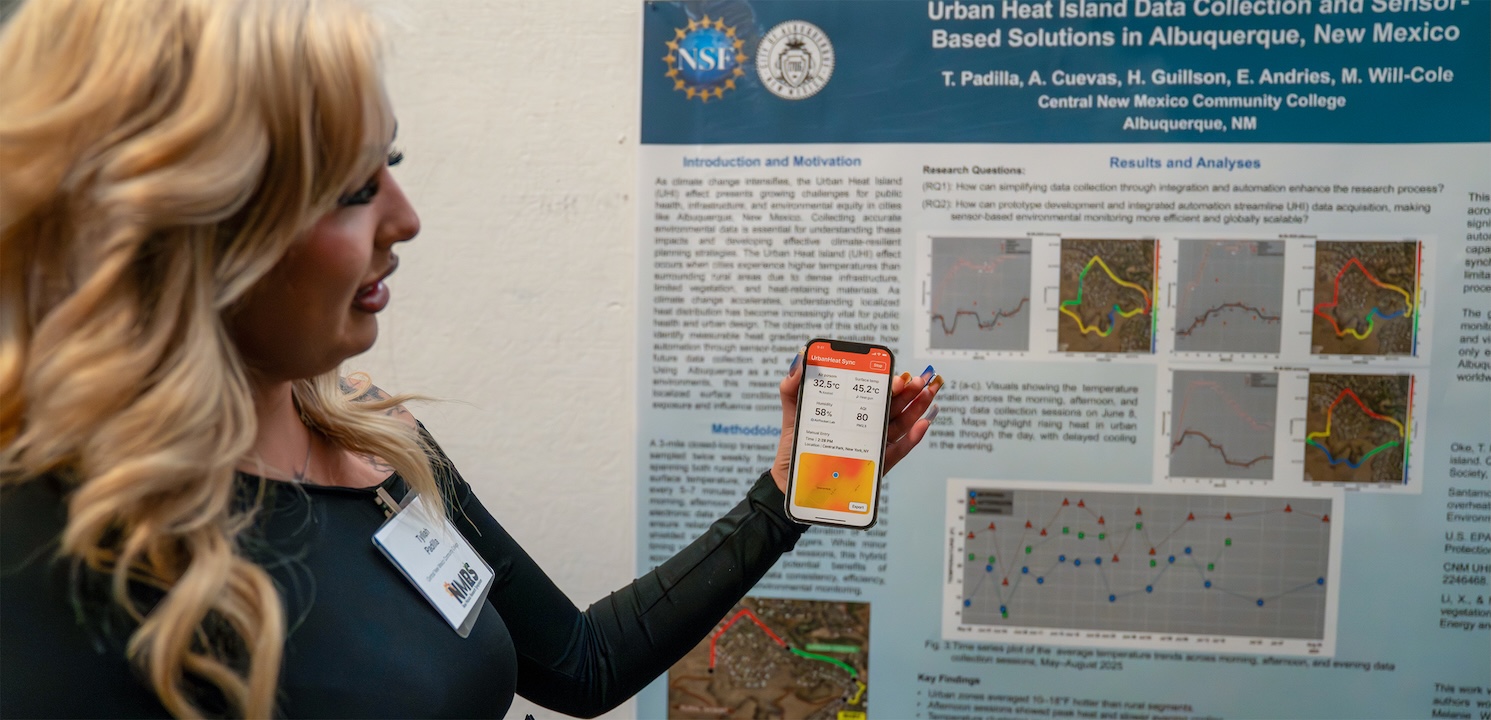 student giving poster presentation