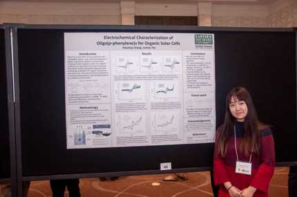 Picture of Xiaochan Zhang in front of her poster